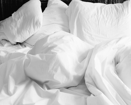 A relaxing bedroom setup with soft lighting for optimal sleep
